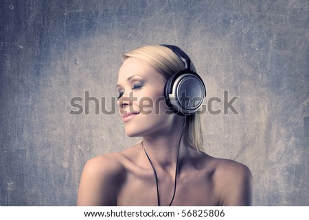 Beautiful woman listening to music