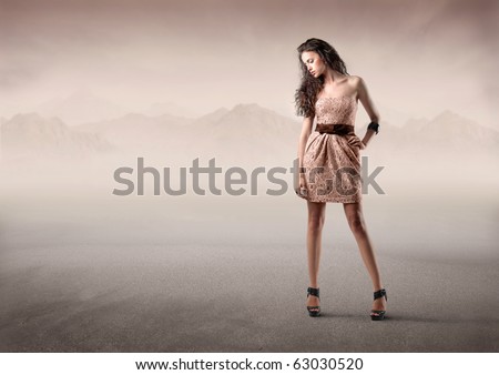 Beautiful elegant woman in the desert