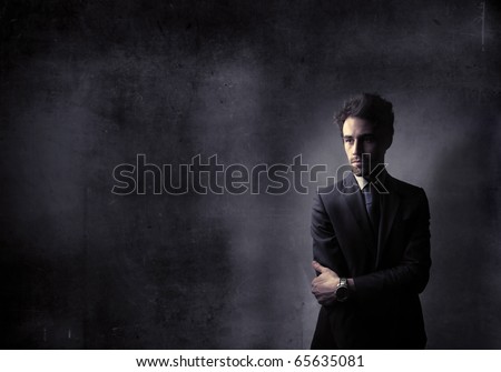 businessman in black with black background