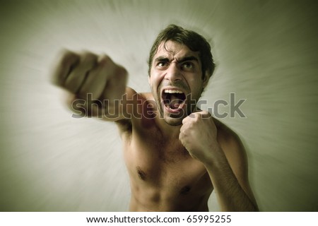 Screaming man punching