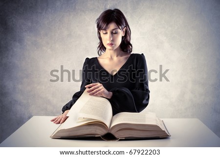 Beautiful woman reading a book