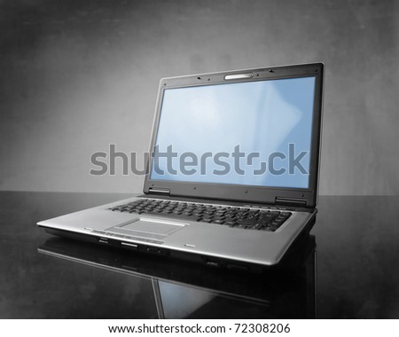 Laptop on a table Laptop on a table