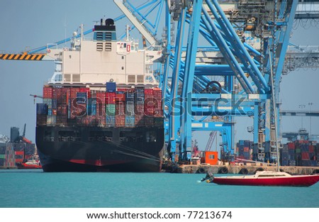 Big merchant ship in a harbor