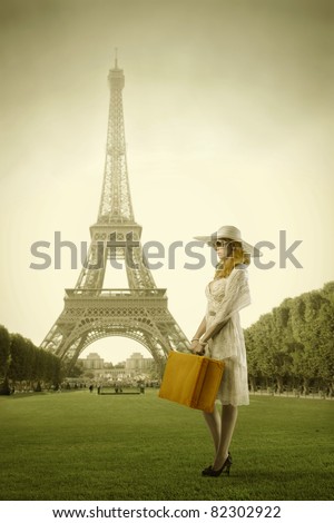 Beautiful Pictures  Eiffel Tower on Beautiful Woman Holding A Suitcase With Eiffel Tower In The Background