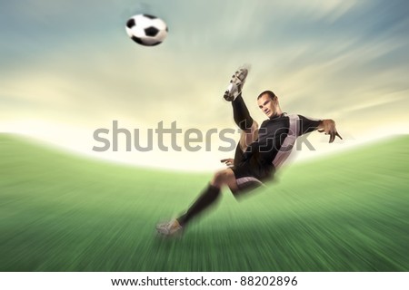 Football player shooting a football