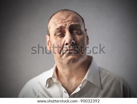 Sad man crying