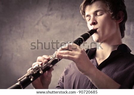 man playing clarinet