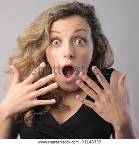 Young woman with surprised expression