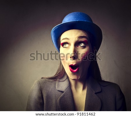 Woman with funny hat and amazed expression