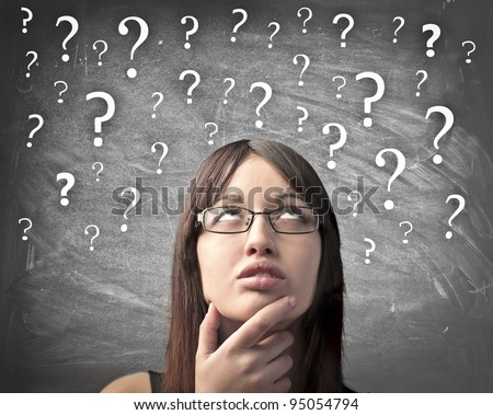 Woman with doubtful expression and question marks all over her head