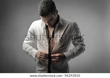 putting on a shirt