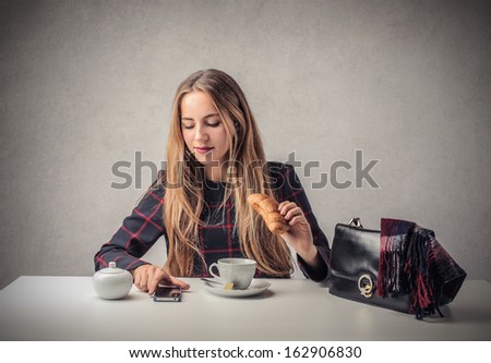 beautiful woman having breakfast before go to work