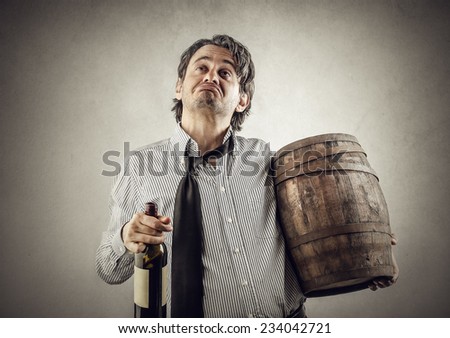 Depressed man with a bottle of wine