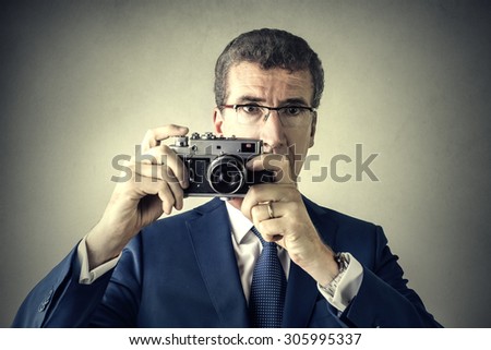 Manager taking a picture