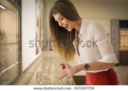 Happy woman in a jewelry