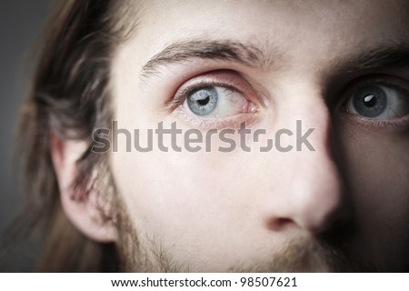 Closeup of a young man\'s blue eyes