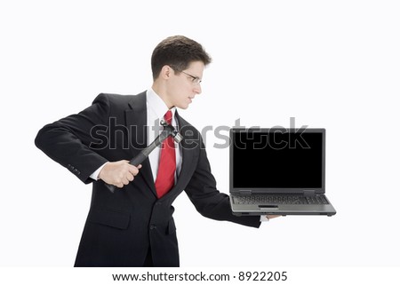 Man in suit getting ready to hit laptop with hammer