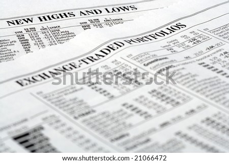 Newspaper listing stocks bonds and portfolios update