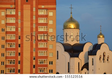 A Russian church and a Soviet block of flats