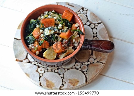 roasted butternut squash with pearl barley, spinach and blue cheese