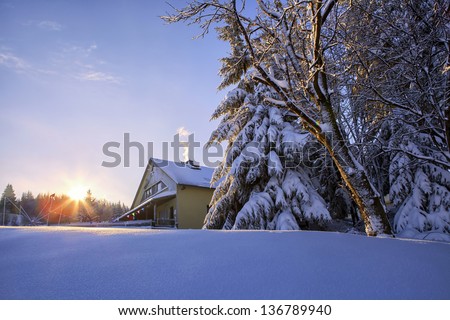 a villa under the light of sunset in winter