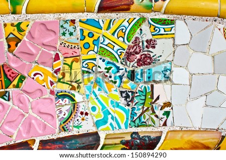 Gentle curve of the wall, decorated with colorful mosaics