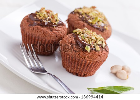Muffin with chocolate and pistachios