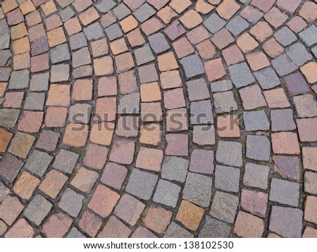 Sampietrini blocks, street paved with a mosaic of small blocks of cobblestones called Sampietrini