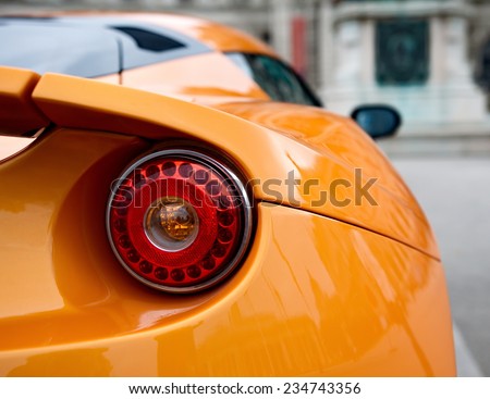 Back of an orange sports car