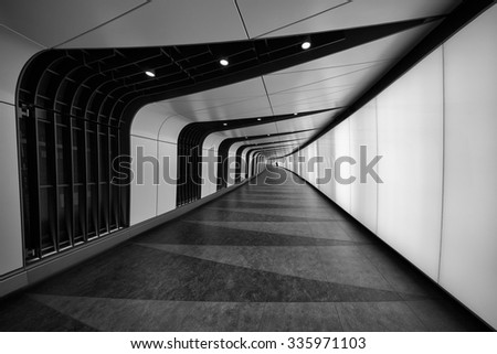 A cool underground path of Kings Cross train station, London, UK.