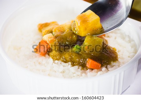Take away food, Thai curry Massaman with rice isolated on white