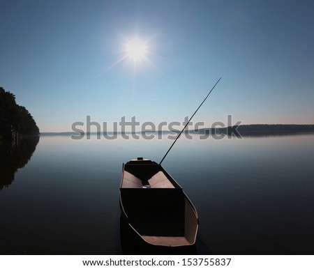 dark lake with boat