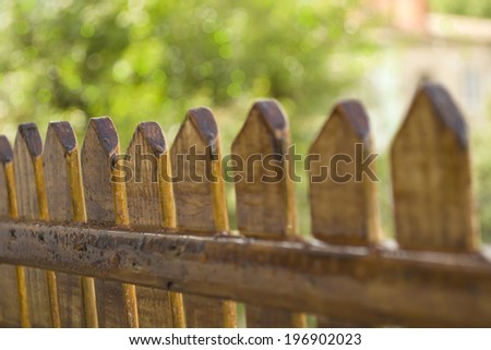 garden fence with a empty sign