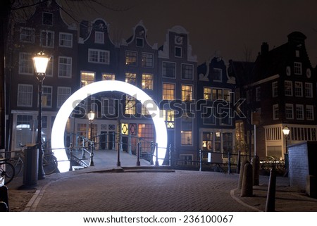 AMSTERDAM, NETHERLANDS - DEC 5: Piece of light art at night during the Amsterdam Light festival in Amsterdam, The Netherlands on December 5, 2014