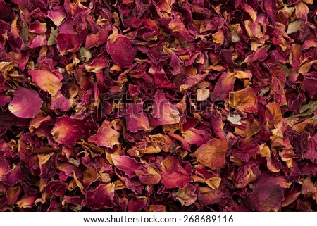 Dried rose petals closeup background