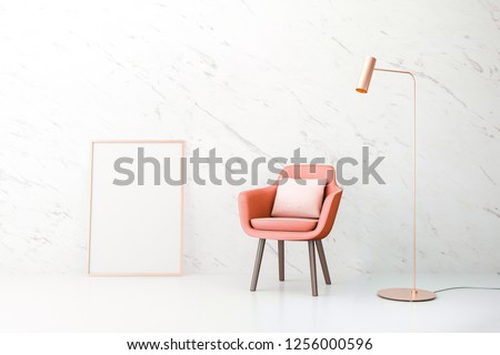 Living coral. The color of the year 2019. The interior wall mock up with a living coral color of chair and copper metal lamp at marble wall. Poster mock up with vertical metal frame. 3d illustration.