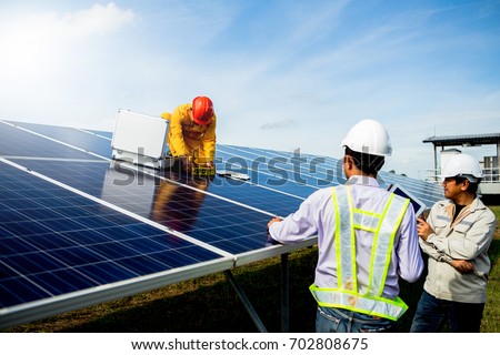 Technician team Repair and maintenance of solar panel