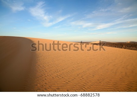 Remote isolated sand dunes in the Western Sahara