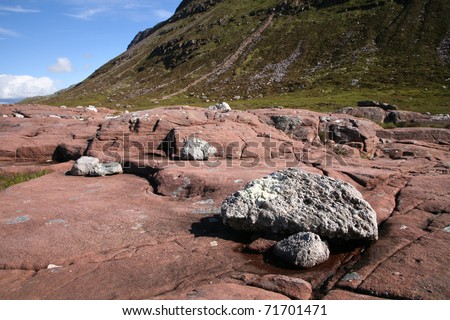 Superb example of different rock types in the ancient land of the north-west highlands Geopark in Scotland, at the base of Suilven Mountain.