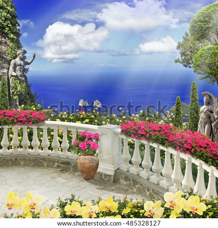 Old balcony with flowers with sea and statue view