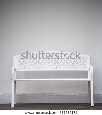 White  chair in  white wall background