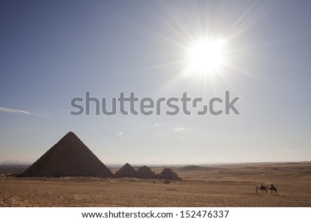 CAIRO, EGYPT - DECEMBER 2009: A panoramic view of the Great Pyramids of Giza located on the outskirts of Cairo.
