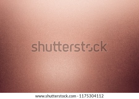 Rose Gold foil texture background. Pink metal glitter color.