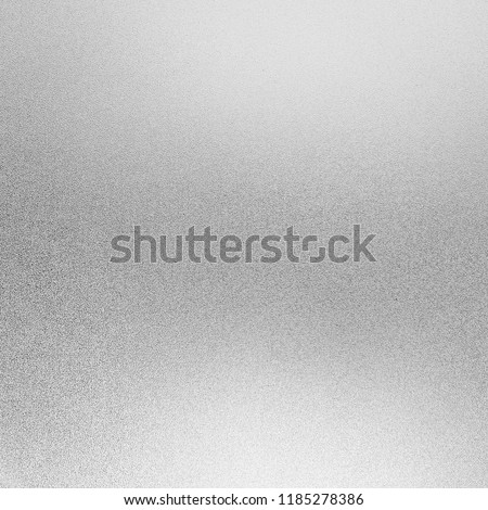 Silver foil background texture and White shiny shimmer metal wall, with glitter and sparkle for christmas paper card and paillette glow or glamour gray color, Abstract bright light or sequin material.