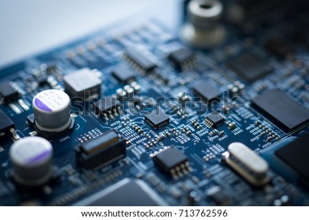 Computer board chip circuit cpu core blue technology background or texture with processors microelectronics hardware concept electronic device motherboard semiconductor