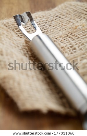 Engraving knife on a wooden board