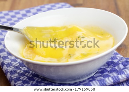 Beaten eggs with cress for scrambled eggs