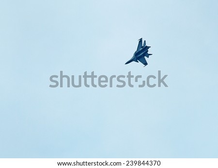 TRIVANDRUM, KERALA, INDIA, DECEMBER 24, 2014: Acrobatics in the skies. Russian-made fighter aircraft Sokhoi  taking part in Trivandrum airshow.