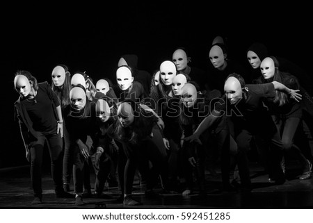 dynamic dance drama on stage in theater- theater group on stage - Masks on stage in theater