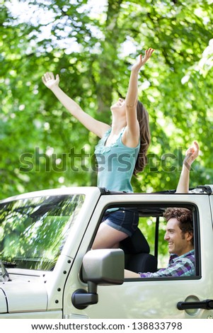 Attractive Young Romantic Couple Enjoying In Ride Through The Forest.